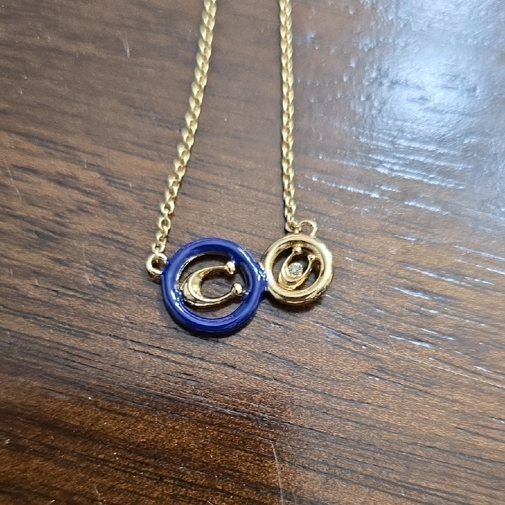 Coach Gold Necklace with Blue Pendant and Swarovski Crystal